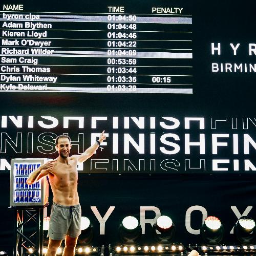Sam Craig celebrating his HYROX win at Birmingham NEC